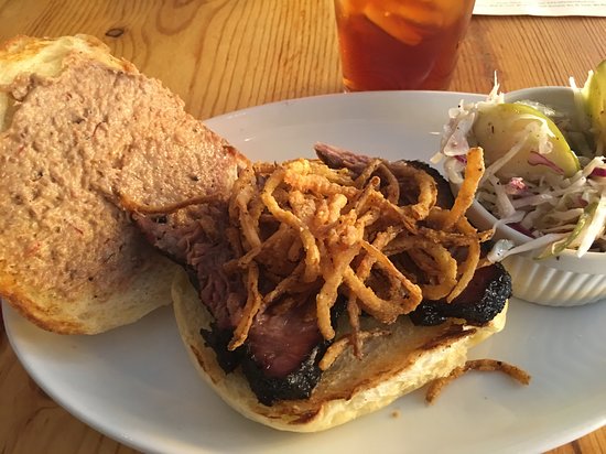 Salt + Smoke signature dishes Brisket Sandwich
Oklahoma Double Bacon Cheeseburger
Trashed Ribs